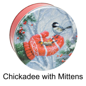 Holiday gift tin has a design on it of a hand inside a mitten holding a chickadee bird.