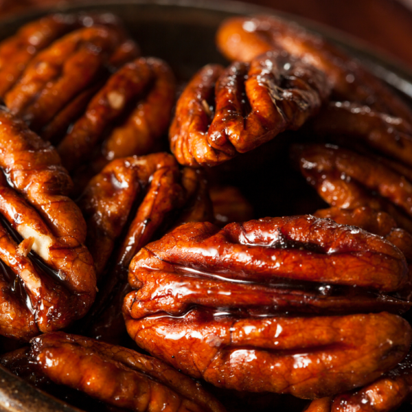 Close up view of honey roasted pecans