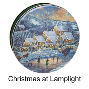 Holiday Gift tin with a picture of an outdoor winter scene of well lit houses decorated for Christmas.